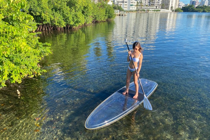 a man that is standing in the water